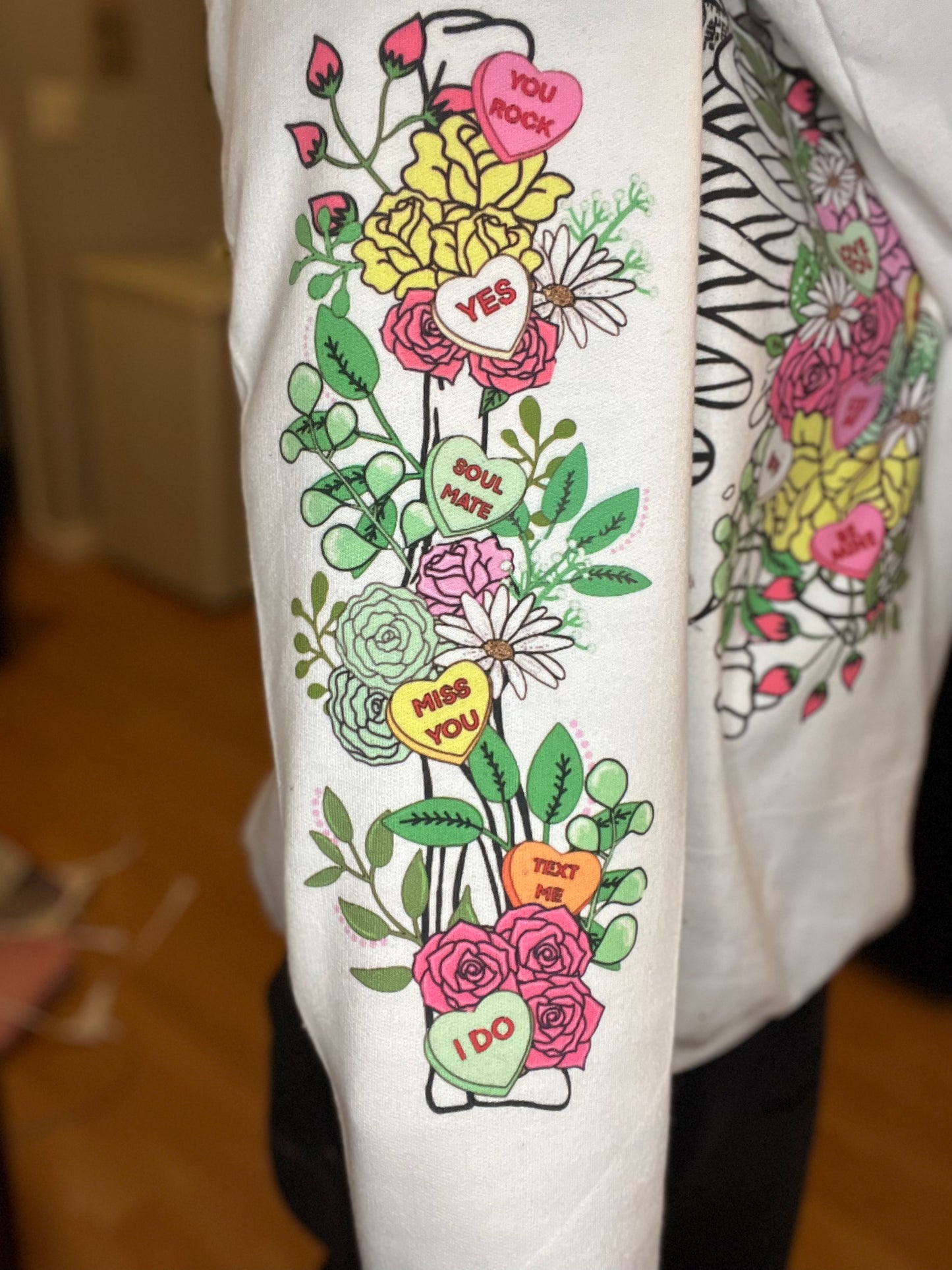 Conversation heart floral sweater